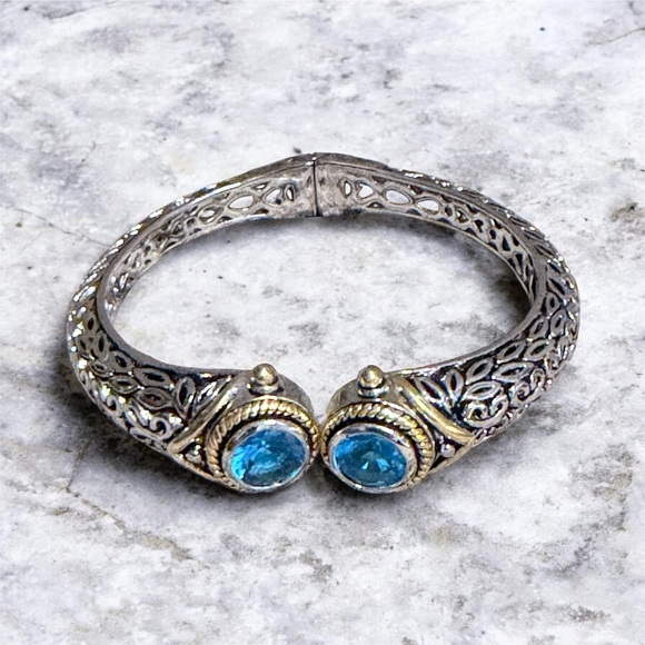 Jewelry - Elegant Silver and Gold Tone Bracelet Blue Accents Dec Birthstone Hinge Bangle